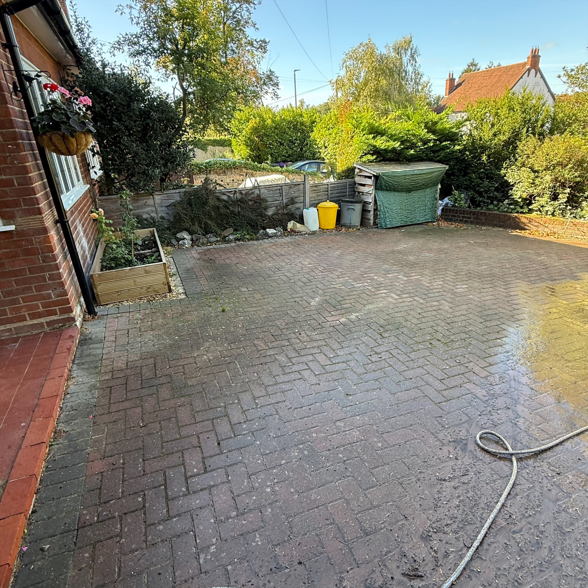 Weathered decking before professional cleaning in Welwyn